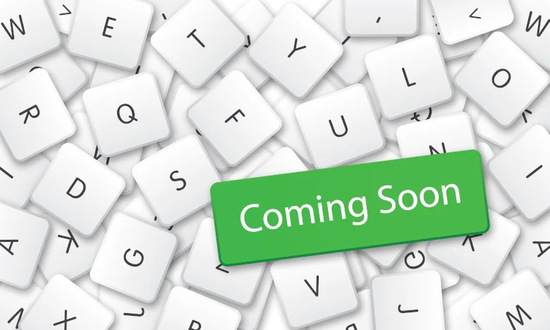 Coming Soon mit weißen Tasten im Hintergrund